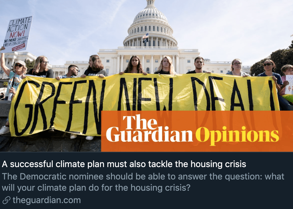 Guardian photo of people holding green new deal banner